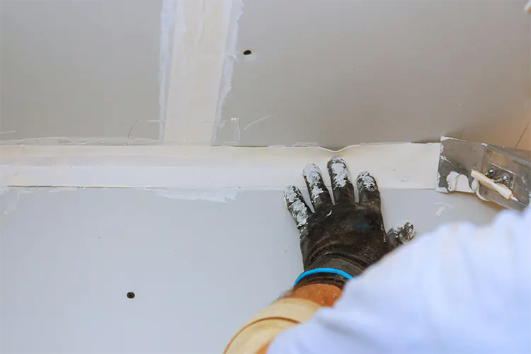 Drywall repair: backing strip method