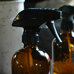 Spray bottle with water for carpet cleaning